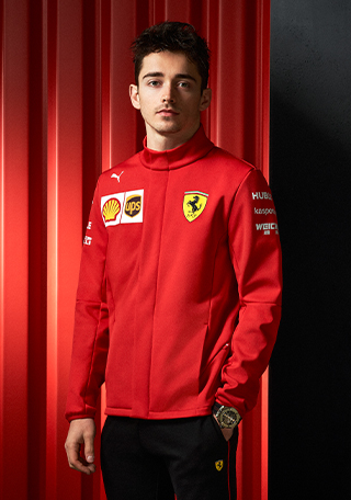 THREE-QUARTER HALF-BODY CHARLES LECLERC WEARING SCUDERIA FERRARI 2020 REPLICA MEN’S SOFTSHELL TEAM JACKET
