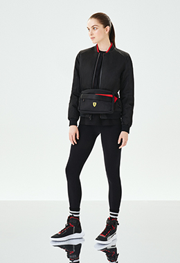 Whole-body woman wearing black and red clothes and accessories.