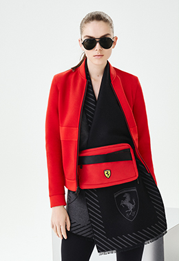 Half-body woman wearing Scuderia Ferrari Collection clothes and accessories