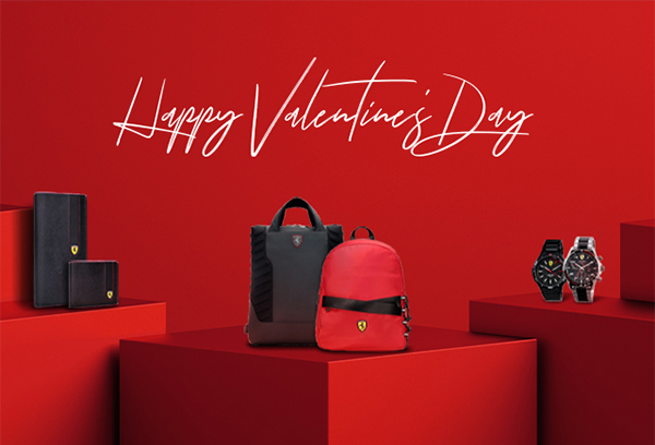 Happy Valentine's Day message and accessories placed on red geometric blocks.