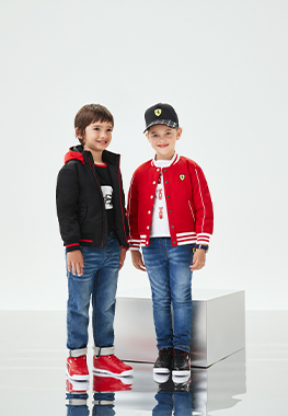 WHOLE BODY BOY AND GIRL WEARING SCUDERIA FERRARI CLOTHES AND ACCESSORIES