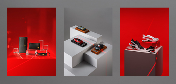 SMALL LEATHER GOODS, SCALE MODELS AND SNEAKERS ON GEOMETRIC BLOCKS.