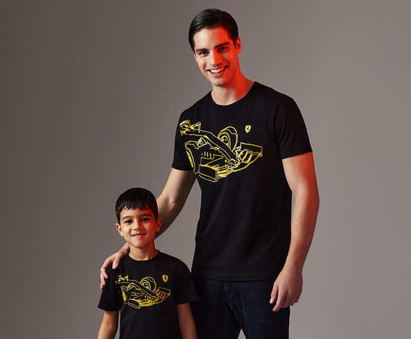 HALF-LENGTH PICTURE OF A MAN AND A KID WEARING JERSEY T-SHIRT WITH FORMULA 1 SINGLE-SEATER TECHNICAL DESIGN.