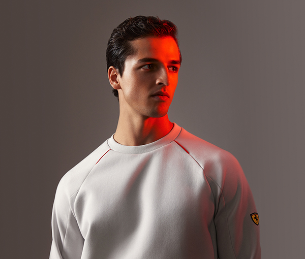HALF-LENGTH PICTURE OF A MAN WEARING GREY SCUBA SWEATSHIRT