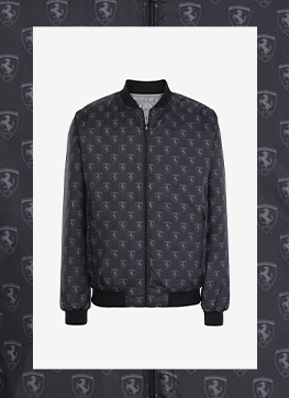 BLACK JACKET WITH ALL-OVER FERRARI SHIELD PRINT.