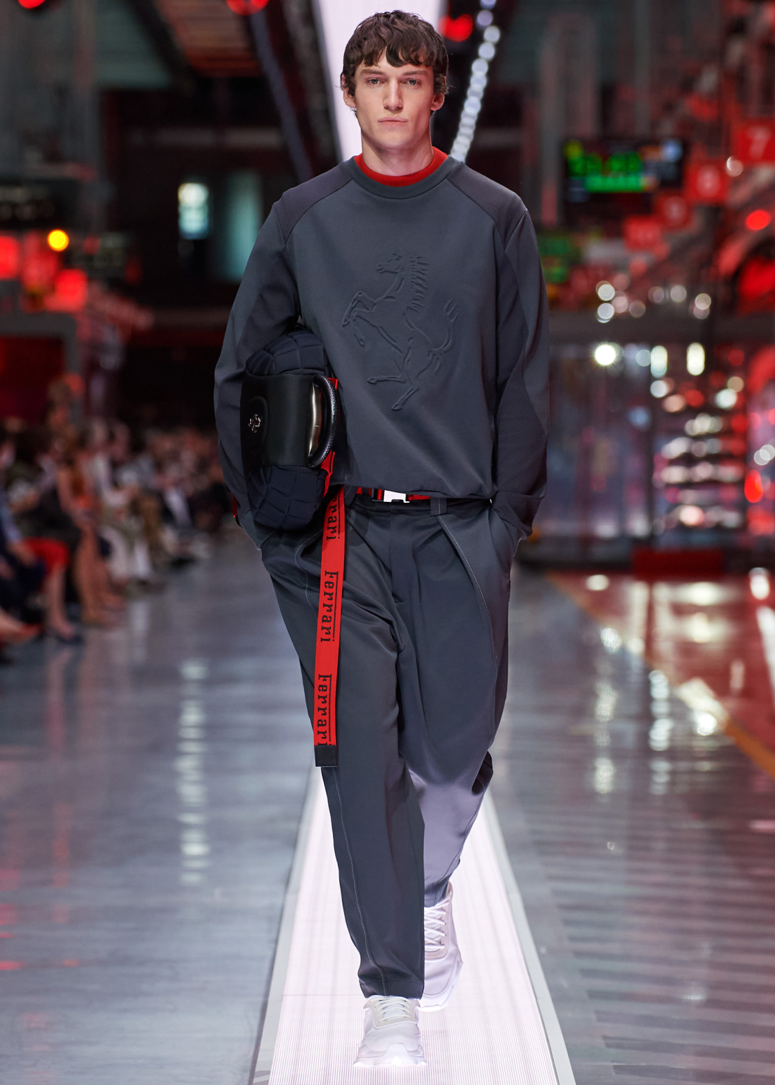 Man on the catwalk wearing top and trousers