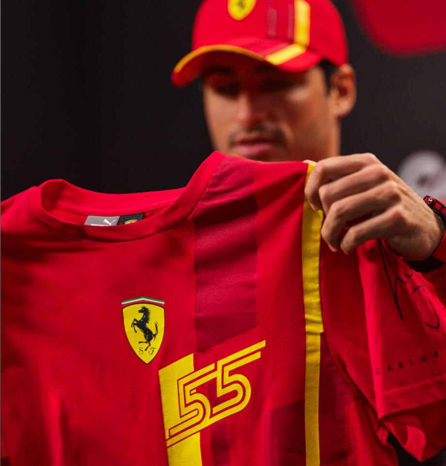 Carlos Sainz with a Scuderia Ferrari Team Replica - Barcelona Special Edition cap and T-shirt