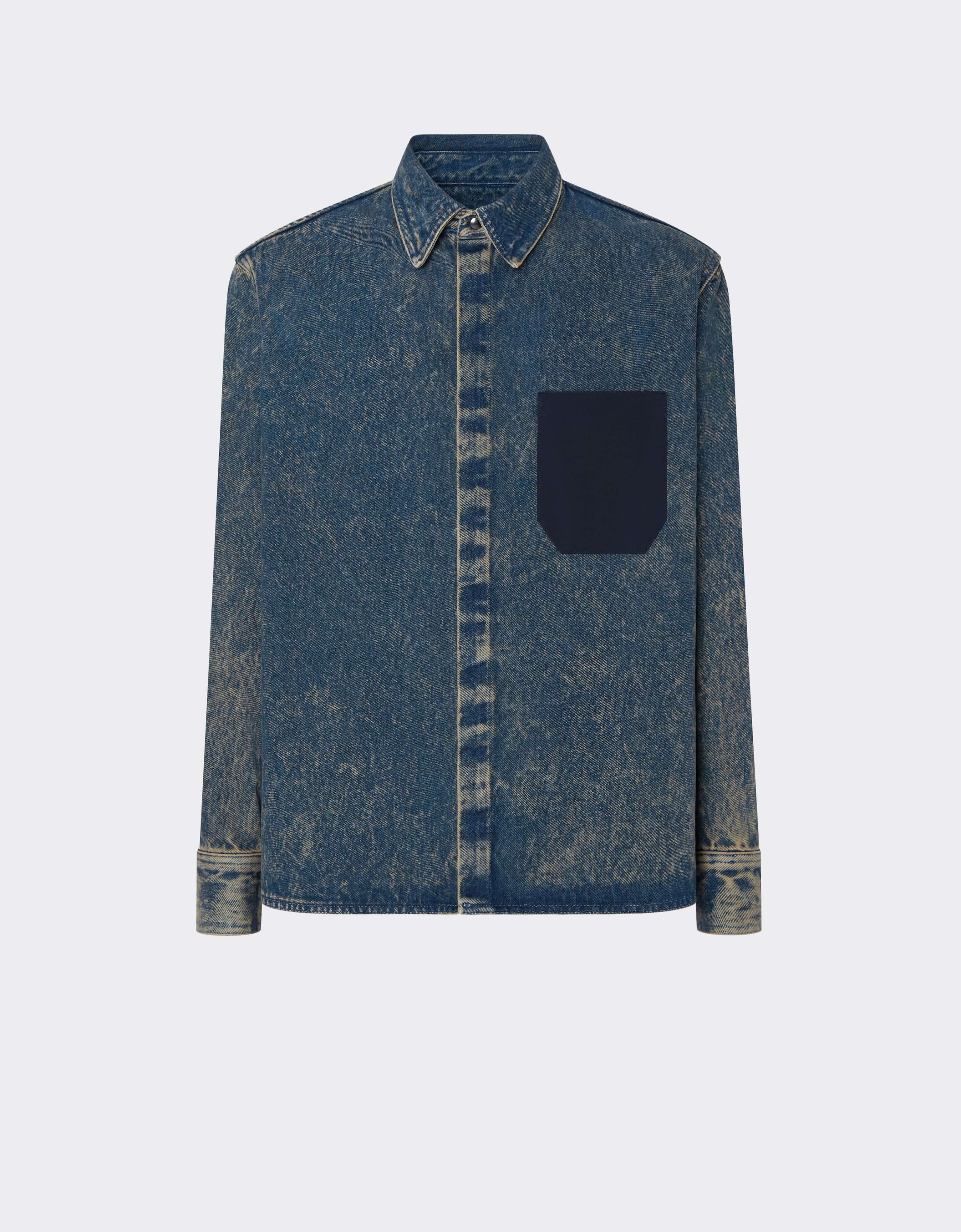 Denim jacket with marbled dye effect