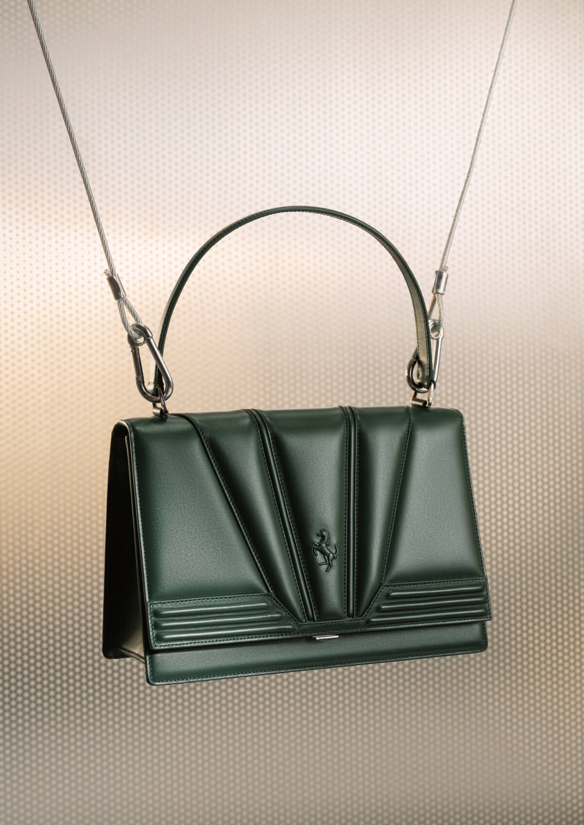 Bag with handle and shoulder strap, embellished with high-frequency embossed motif