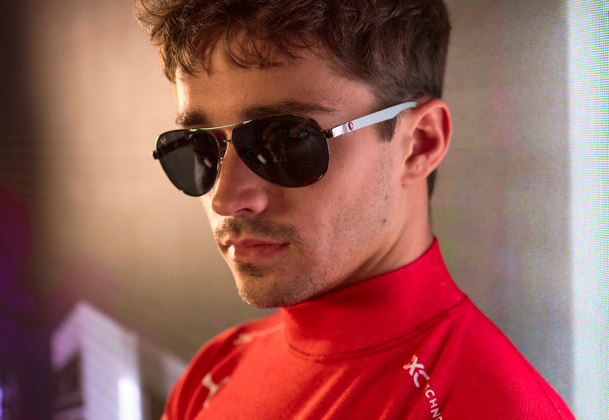 Aviator sunglasses in carbon fibre with red temples and Ferrari Shield detailing