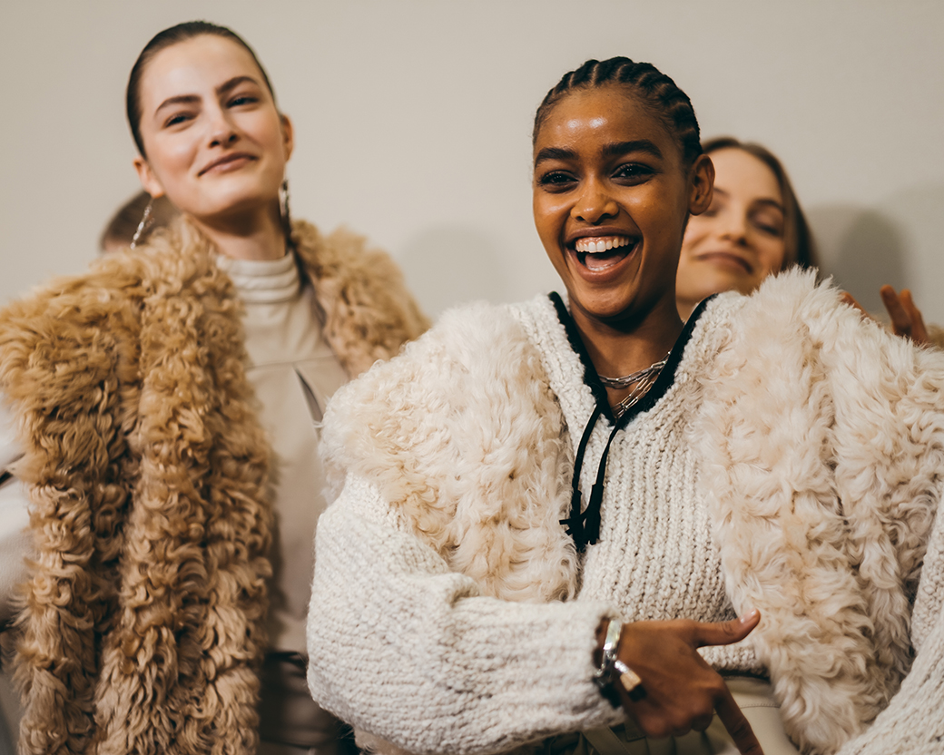 the models are wearing shearling coats from the FW20 show